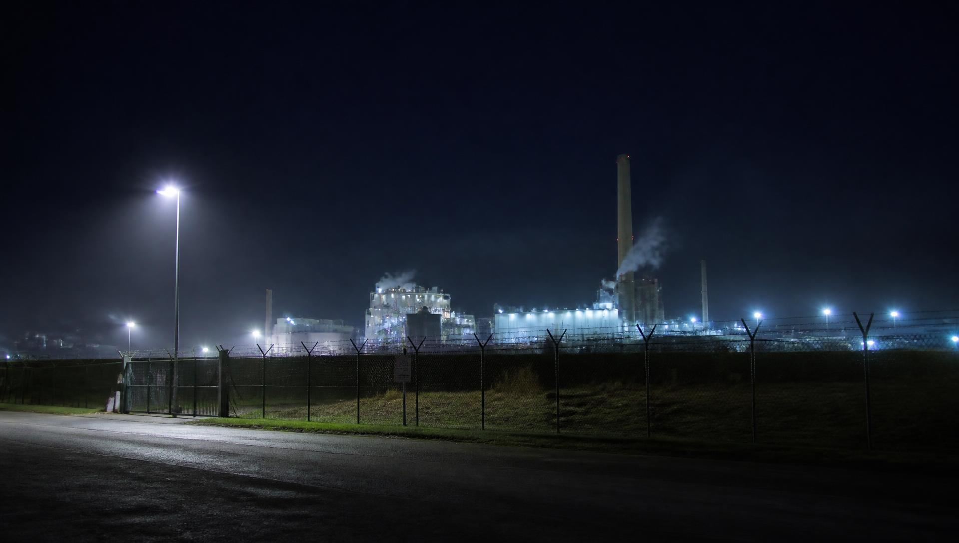 Secure industrial facility at night